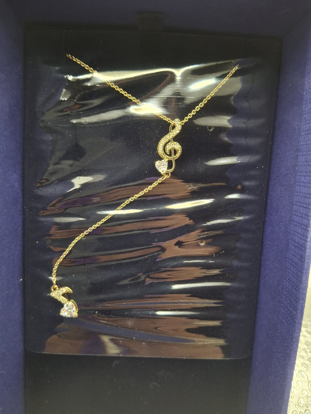Swarovski Gold-Tone Musical Note Pendant Necklace with Clear Stones